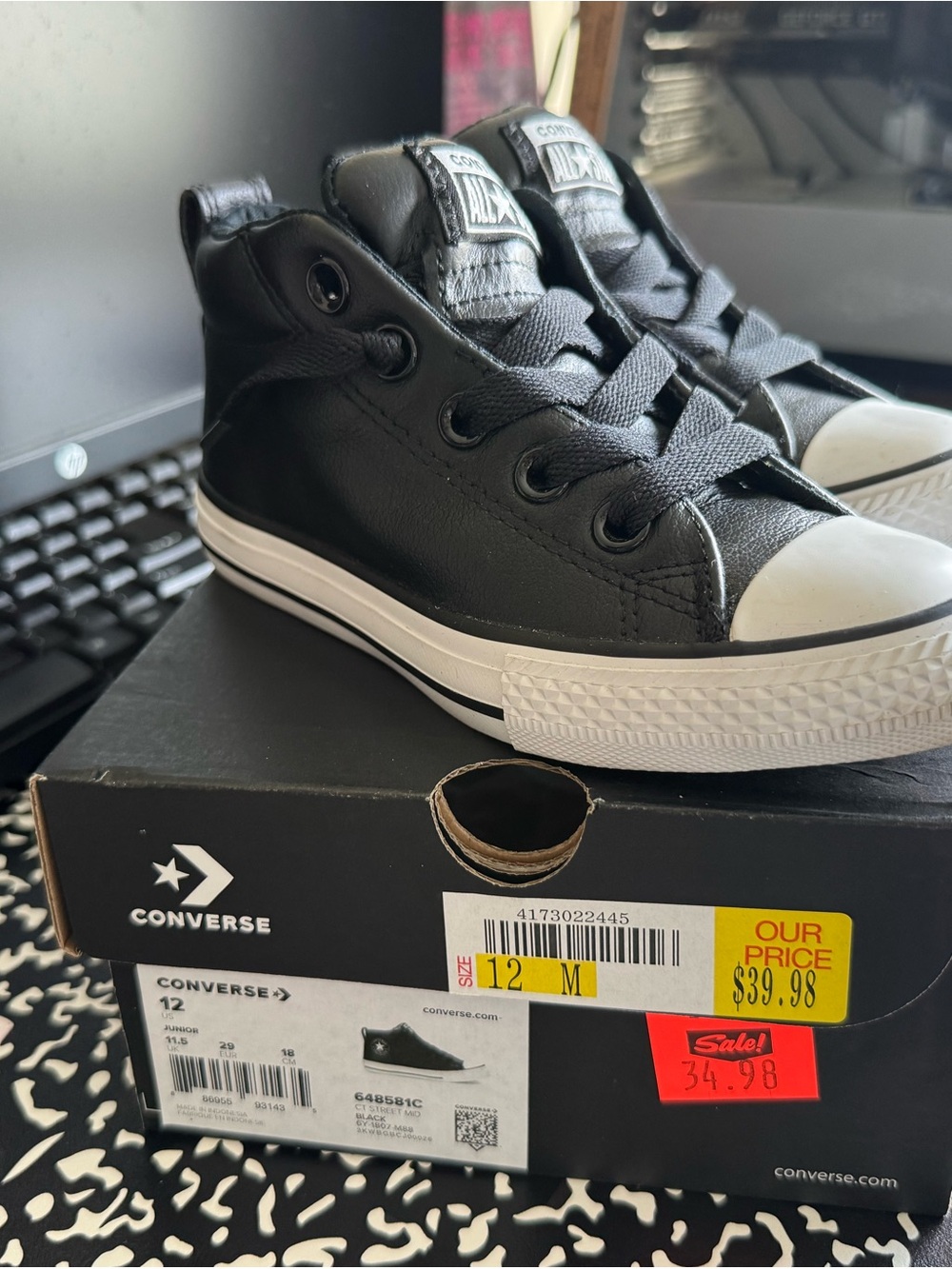 Converse Black and White Leather High Top Sneakers